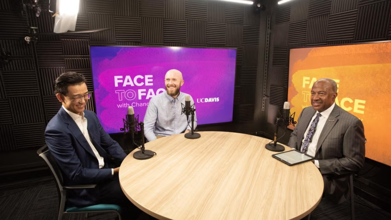 Rain Sun and Sam Louderback sit with Gary May in a podcast studio