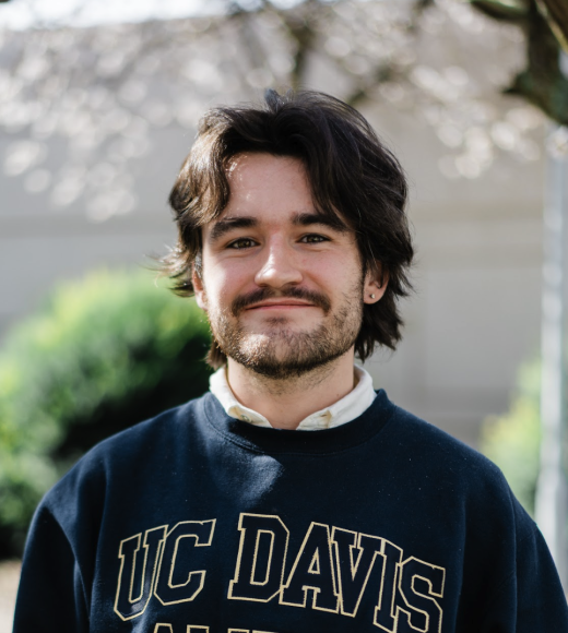Portrait of Joe Clifford outside in the Kemper courtyard